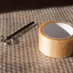 Tape and scissors for blister care