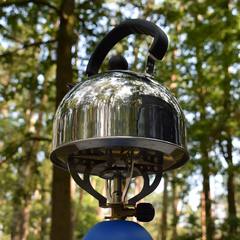 Camp stove kettle in the forest