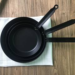 Stack of nesting camp frying pans