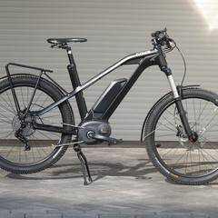 Electric mountain bike parked outside